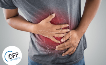 The photo of large intestine is on the man's body against gray background, People With Stomach ache problem concept, Male anatomy