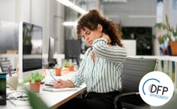 Side view portrait of stressed woman suffering from a neck contracture while sitting the office